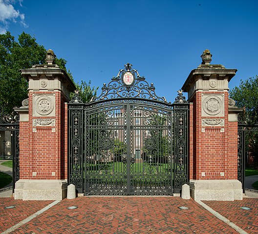 The iconic Van Wickle Gates at Brown University, one of America's prestigious "Ivy League" colleges, in Providence, the capital of, and largest city in, Rhode Island. The ornamental entrance to the main campus were built with the bequest of graduate Augustus Stout Van Wickle, who was president of a bank and several coal corporations. Dedicated in 1901, the gates stand as a symbol for the campus and its long history.